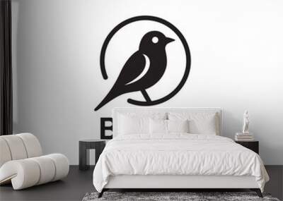 Bird logo in minimalist style. vector little bird silhouette. Suitable for animals, pets or sounds logos. Wall mural