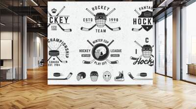 Vintage hipster logo templates and 9 design elements for ice hockey emblems. Label, badge, emblem for Ice Hockey. Hockey Helmet, Puck, Cues icons.Vector illustration Wall mural