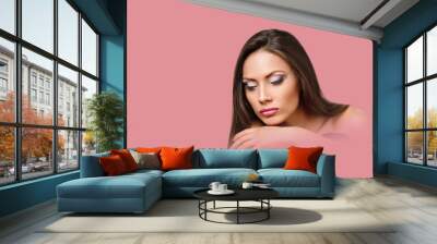 woman with straight long hair and clean skin - on background amarnth shade pink Wall mural