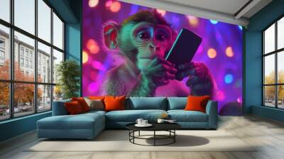 Monkey using smartphone with neon lights background Wall mural