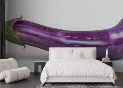 One single fresh ripe long purple eggplant lying on white background Wall mural