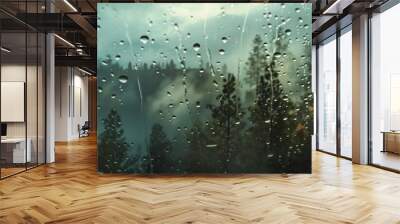 Rainy forest view through wet glass window Wall mural