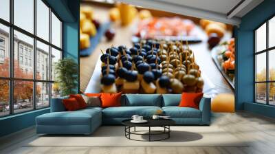 Snacks on toothpicks, daylight and beautiful bokeh Wall mural