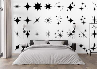 Sparkles icon vector set. Twinkling stars illustration sign collection. Shining burst symbol. Star logo. Wall mural