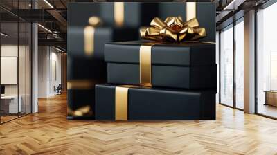 Stack of black gift boxes with gold ribbons is standing on black background Wall mural