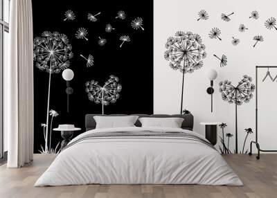 Dandelion flying in the wind on black and cream background Wall mural