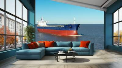 Large bulk cargo ship underway. Big bulker vessel cargo export and import operation. Wall mural