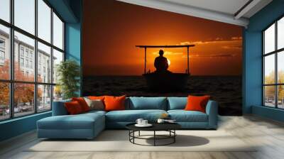 Silhouette of a Fisherman in a Small Boat at Sunset Over Calm Waters Wall mural