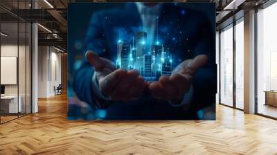 Business man with design modern building blue hologram. Real estate for investment Wall mural