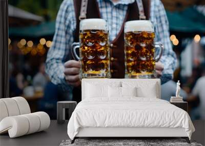 Man in floral-embroidered vest holding two beer mugs, celebrating Oktoberfest in traditional Bavarian style. Wall mural