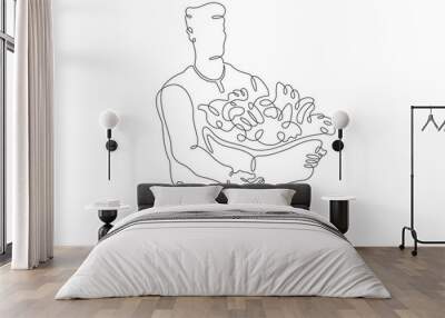 Farmer with products. A man carries a box of vegetables and herbs. Farmer with eco products.One continuous line . Line art. Minimal single line.White background. One line drawing. Wall mural