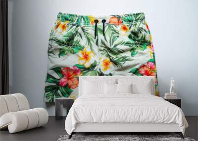 Floral Patterned Men's Swim Shorts on White Background Wall mural