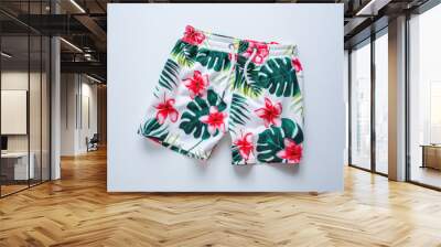 Floral Print Swim Trunks with Tropical Design on White Background Wall mural