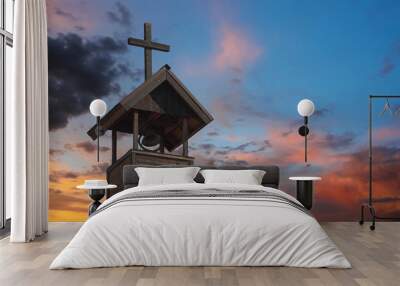 A Bell Tower with Cross at Sunset Wall mural