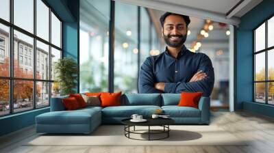 Happy Indian businessman professional leader standing arms crossed in office. Smiling male employee, business man company executive manager, confident eastern entrepreneur at work, Generative AI Wall mural