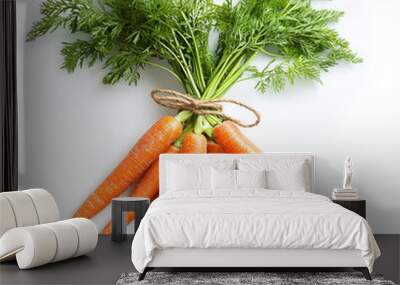 Create an image of a fresh bunch of carrots, isolated on a clean white background. Bunch of carrots  Wall mural