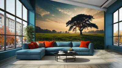 World environment day concept Silhouette alone tree on beautiful meadow wallpaper background Wall mural