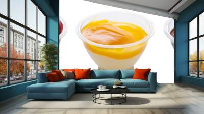 Mango strawberry and chocolate yogurt mousse dessert on white background Wall mural