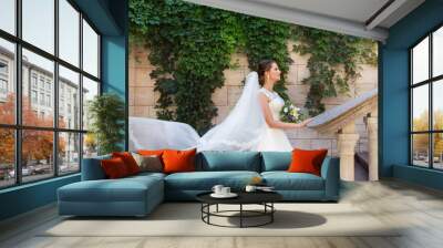 Stylish Bride in an expensive white dress Wall mural