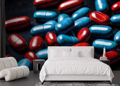 Closeup of Blue red medicine pill tablets on black background, medical vitamin capsule drugs for healthcare treatment, pain relief pharmaceutical medicine Wall mural