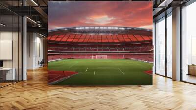 A soccer stadium filled with vibrant green grass, surrounded by towering stands. Wall mural