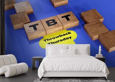  TBT abbreviation of Throwback Thursday, 3D acronym wood text block concept on blue background Wall mural