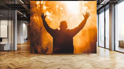 Man lifting his hands in appreciation  Wall mural