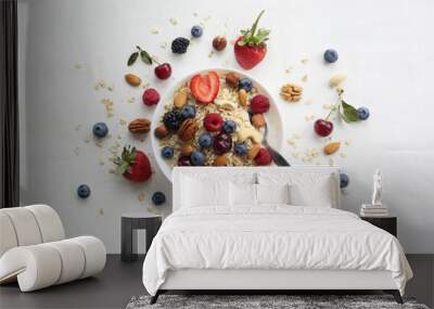 Oatmeal porridge in bowl topped with fresh blueberries, cranberries and homemade crunchy granola Wall mural