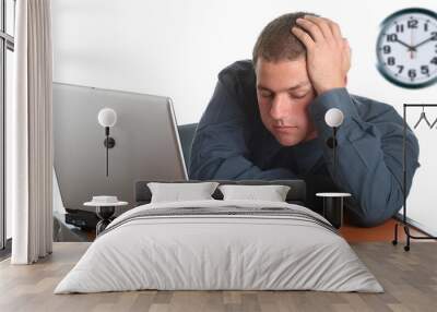 young businessman working on laptop Wall mural