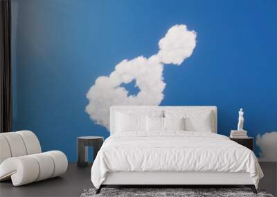 3d rendering of white clouds in shape of symbol of guitar on blue sky with sun Wall mural