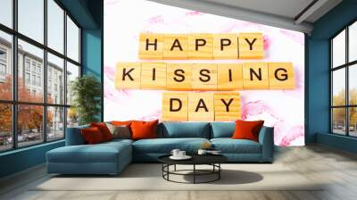 Concept for the International Day of Kisses. Lip prints on paper and text Happy day kisses. Wall mural