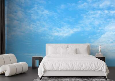 Blue sky background and white clouds soft focus Wall mural