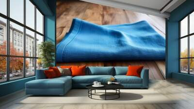 closeup of blue folded cleaning cloth on wood floor Wall mural