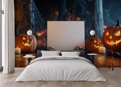 Halloween celebration with jack-o'-lanterns surrounded by colorful autumn leaves Wall mural