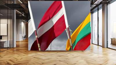 The Baltic States three national flags with dark sky in the background Wall mural