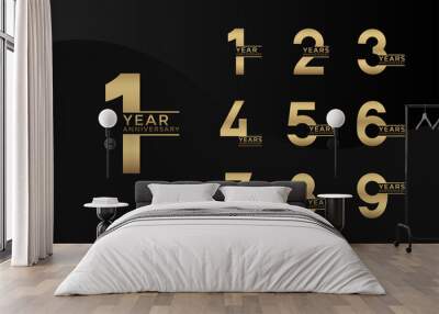 Set of Anniversary logotype gold color with black background for celebration Wall mural