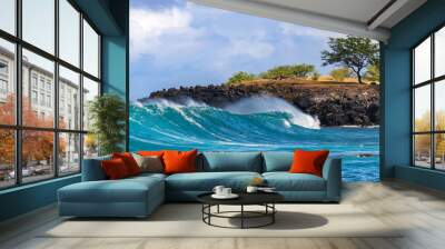 Wave breaking on Kona coast of Hawaii's Big Island. Trees on rocky ledge behind. Cloudy sky in the background. 
 Wall mural