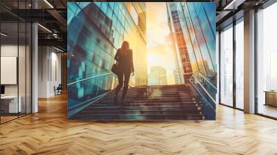 business and career concept, back view of business woman climbing up the stairs in business city with skyscrappers Wall mural