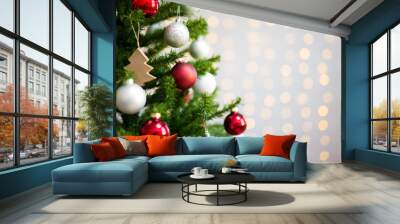 christmas and new year background - decorated christmas tree over white wall with lights Wall mural