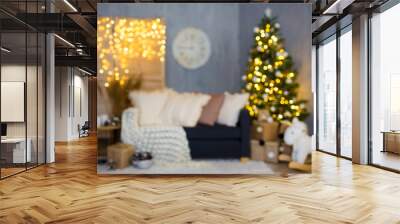 Christmas background - blurred decorated living room with Christmas tree, gifts and garlands Wall mural