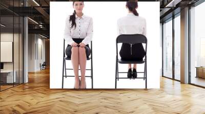 front and back view of young woman sitting on office chair isola Wall mural