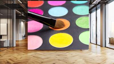 Make-up brush and eyeshadow palette close up Wall mural