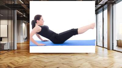 sporty woman doing strength exercises for abdominal muscles isol Wall mural