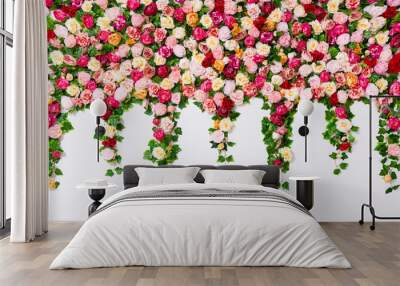 spring and summer background - close up of colorful composition with artificial flowers over white wall Wall mural