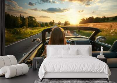 summer, vacation and travel concept, back view of young woman driving cabriolet car Wall mural