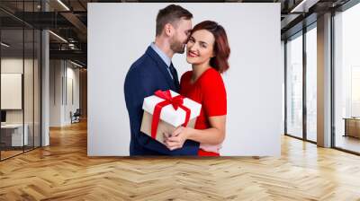 valentine's day, relationship and love concept - portrait of couple in love with gift box over white Wall mural