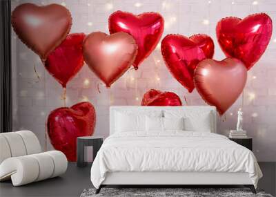 Valentine's day background - group of red heart shaped balloons over brick wall Wall mural