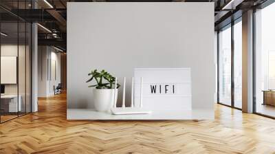 wifi connection concept - white router on table with copy space Wall mural