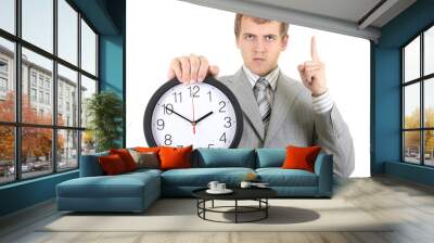 young businessman holding a clock Wall mural