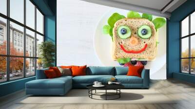 Healthy and fun food for kids , happy and funny face sandwich Wall mural